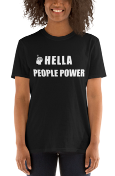 Person wearing a black unisex t-shirt that says “Hella People Power” in large bold font across the chest. Also shows the CDP logo, which is the silhouette of a head with the Oakland tree as a brain and a lightbulb over the head.